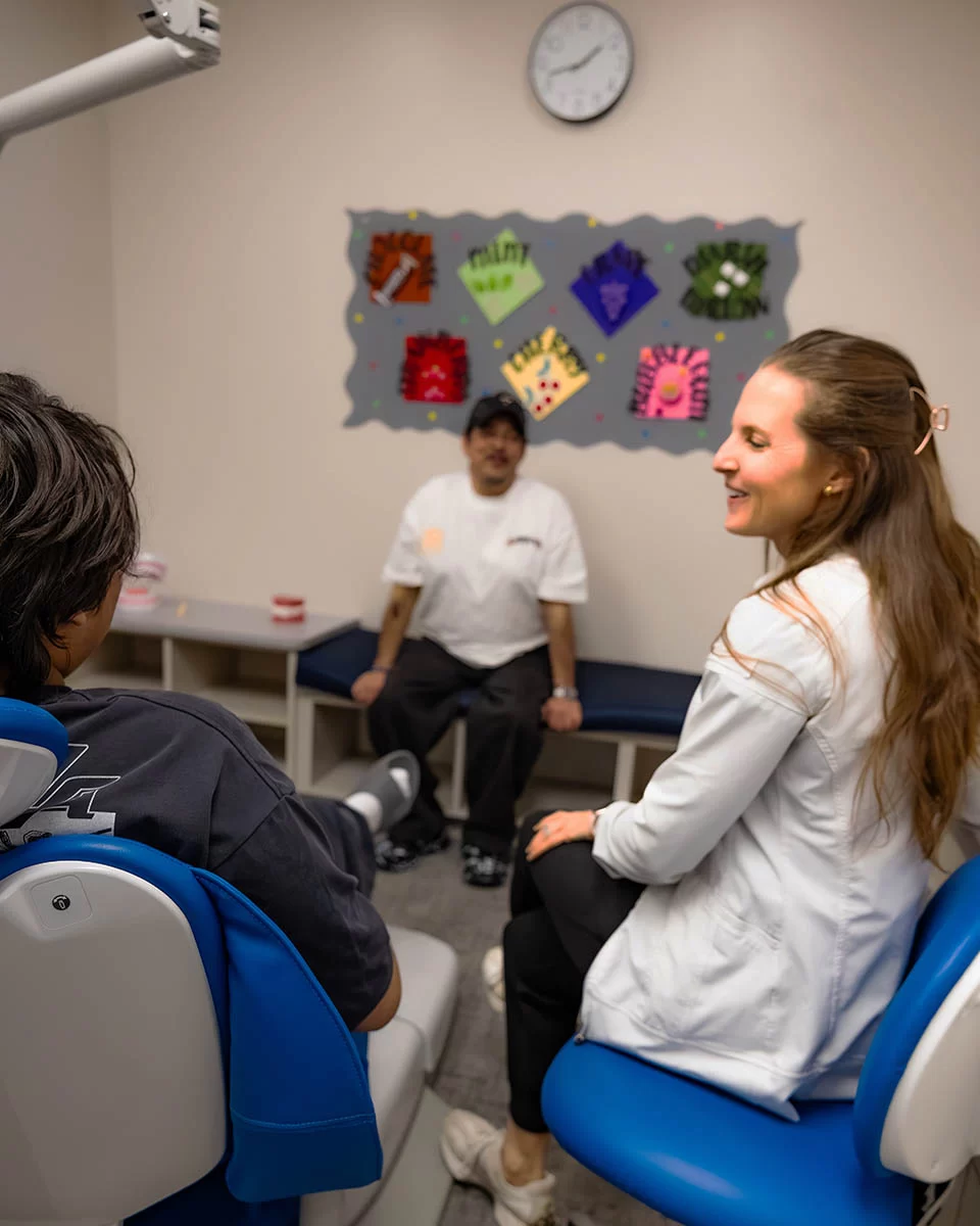 Dr. Foreman with patients